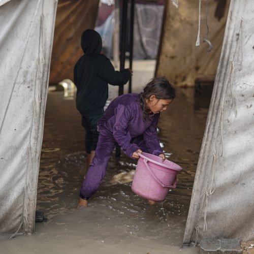 Displaced Palestinian families living in Gaza City facing harsh conditions as their shelter options remain extremely limited, leaving families to endure heavy rainfall inside flooded makeshift tents in Gaza City, on November 16, 2025. The harsh weather and inadequate living conditions continue to intensify the challenges for thousands trying to survive under already dire circumstances, with Israel blocking the entry of tents and mobile homes into Gaza. Photo by Omar Ashtawy apaimages